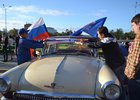Машины украшают флагами и цветными стикерами. Фото IRK.ru