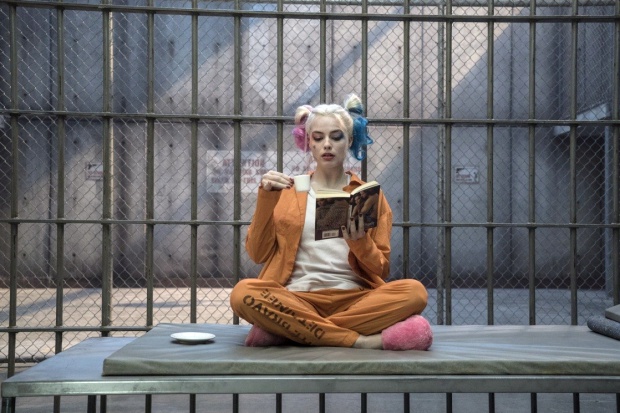 Margot Robbie as insane Harley Quinn. Image  www.kinopoisk.ru site