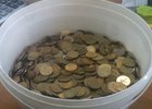 Монеты в ведре. Фото предоставлено УФССП по Иркутской области