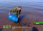 Мальков пеляди выпускают в водохранилище. Фото с сайта www.bst.bratsk.ru