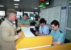 Проверка пассажиров в аэропорту. Фото пресс-службы УФССП по Иркутской области