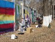 В городке ИВВАИУ художники разрисовали бетонный забор.