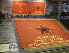 Выписка из наградного листа: «… в составе группы храбрецов пробил себе путь к рейхстагу Красное Знамя с надписью 86, что означает 86 ТГАКБр, водрузил над рейхстагом. Был тяжело ранен». Награжден орденом «Красное Знамя».