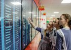 В холле школы установлено первое в Иркутском районе электронное табло с расписанием. Фото Александра Новикова