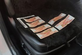 Взятка. Фото пресс-службы ГУ МВД России по Иркутской области