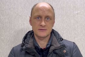 Задержанный мошенник. Скриншот видео пресс-службы ГУ МВД России по Иркутской области