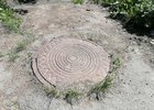 Канализационный люк. Фото Ольги Фонаревой, IRK.ru