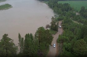 Затопленная дорога. Фото пресс-службы правительства Иркутской области