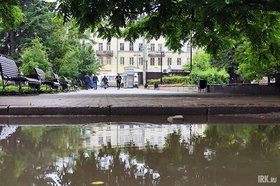 Лужа в Иркутске. Фото Маргариты Романовой, IRK.ru