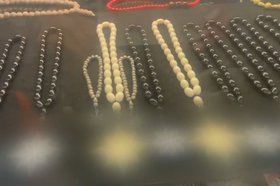 Товары с запрещенной символикой. Скриншот видео пресс-службы ГУ МВД России по Иркутской области