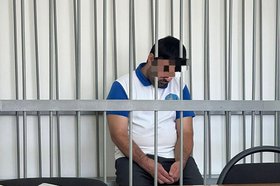 Задержанный мужчина. Фото пресс-службы прокуратуры Иркутской области