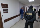 Задержание чиновника. Фото пресс-службы СУ СК РФ по Иркутской области