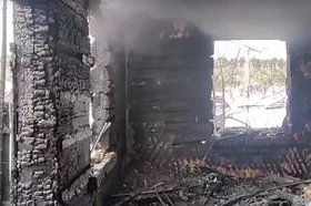 Сгоревший дом. СКриншот видео пресс-службы ГУ МЧС России по Иркутской области