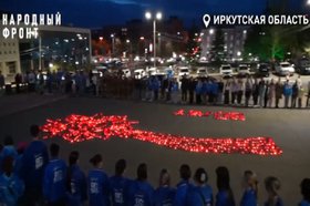 Акция «Свеча Победы». Скриншот видео из телеграм-канала Народного фронта Иркутской области