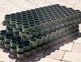 Газонные решетки препятствуют образованию колеи, укрепляют и защищают грунт и газонное покрытие. Их используют на автомобильные парковках, пешеходных дорожках, спортивных площадках, манежах, теннисных кортах.