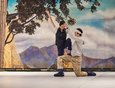 Пока на сцене артисты в будничных костюмах повторяли основные партии…