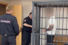 Задержанный мужчина. Скриншот видео пресс-службы СУ СКР по Иркутской области
