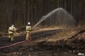 Тушение пожара. Фото Маргариты Романовой, IRK.ru