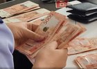 Изъятые деньги. Скриншот видео пресс-службы УФСБ России по Иркутской области
