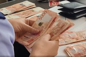 Изъятые деньги. Скриншот видео пресс-службы УФСБ России по Иркутской области