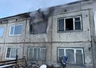 Горела квартира в двухэтажном доме. Фото ГУ МЧС России по Иркутской области