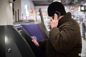 Телефонный мошенник. Фото Маргариты Романовой, IRK.ru
