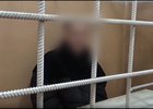 Задержанный мужчина. Скриншот из видео пресс-службы ГУ МВД России по Иркутской области