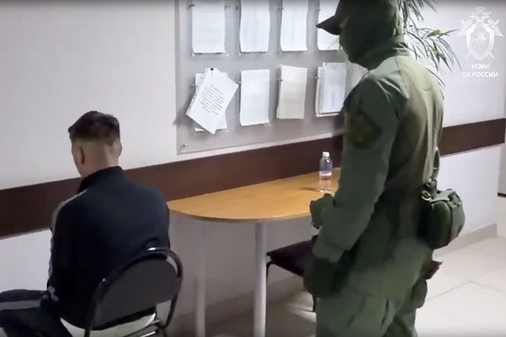 Задержанный участник экстремистского движения. Скриншот видео пресс-службы СУ СКР по Иркутской области