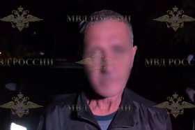 Задержаный мужчина. Скриншот из видео Ирины Волк