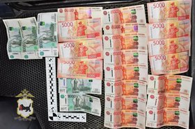 Деньги. Фото пресс-службы ГУ МВД России по Иркутской области