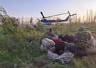 Вертолет в лесу. Фото пресс-службы правительства Иркутской области
