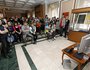 Гости выставки смотрят один из экспонатов выставки - мультфильмы, снятые молодыми авторами-иркутянами.